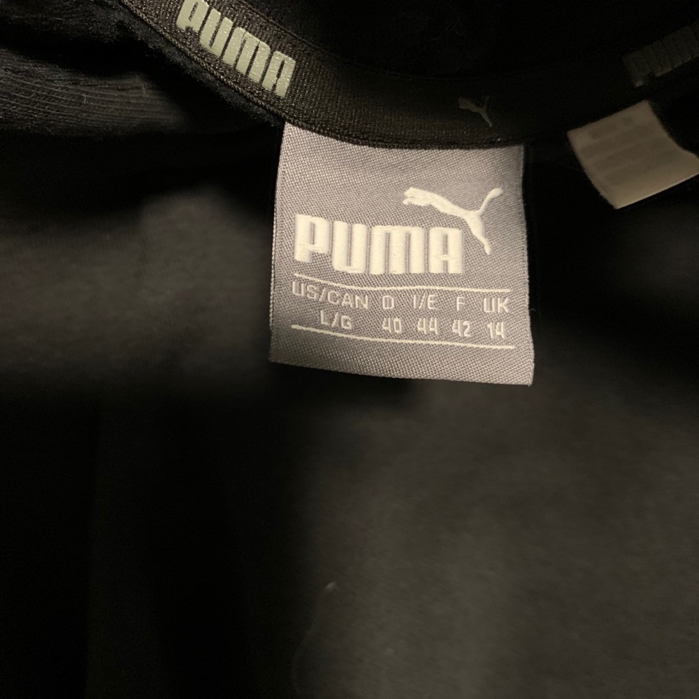 Puma black and gold size large women’s hoodie